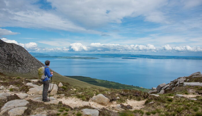 An Absolute Escapes client admiring the view of the Arran coast (credit - Peter Backhouse)