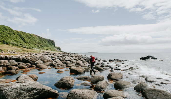 An Absolute Escapes client walking from Machrie to Kilmory (credit - Chrononauts Photography)