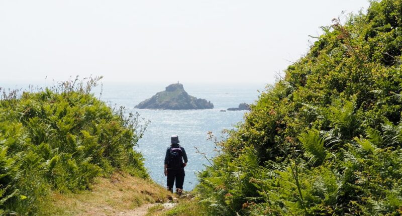 An Absolute Escapes client walking on Herm (credit - Andrew Bond)