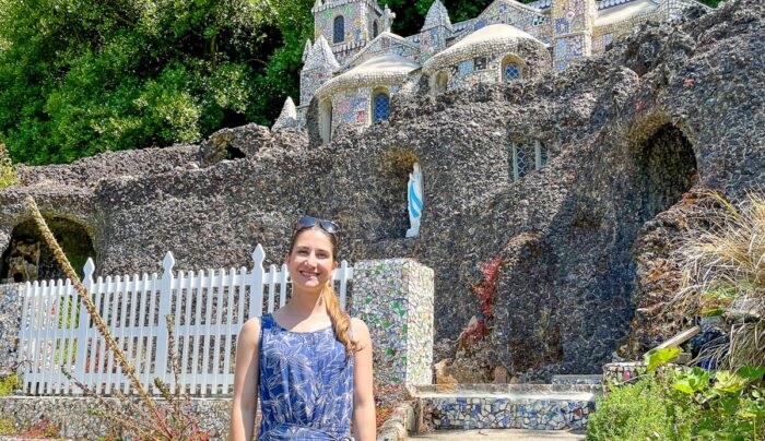 Katia from the Absolute Escapes team exploring The Little Chapel in the Les Vauxbelets valley