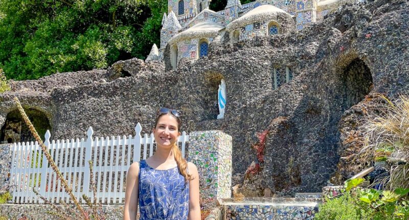 Katia from the Absolute Escapes team exploring The Little Chapel in the Les Vauxbelets valley