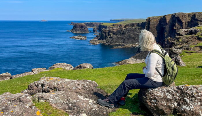 Our client enjoying the views at Esha Ness, Shetland (credit - Poul Møller)