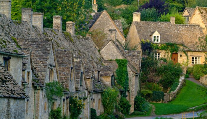 Quaint stone cottages in the Cotswold village of Bibury