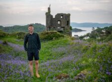 Man at Tarbert Castle in bluebells
