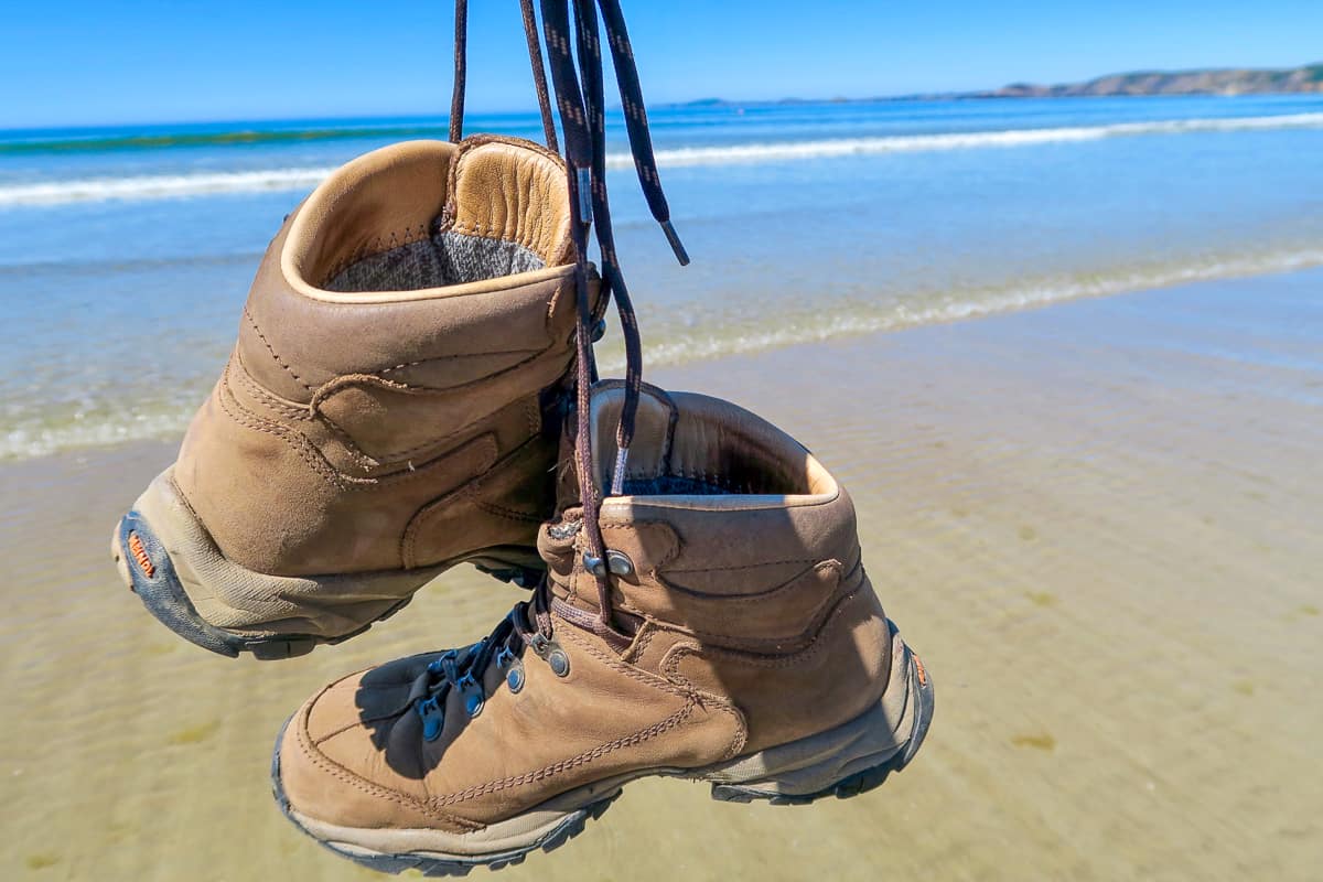 Walking boots on the beach